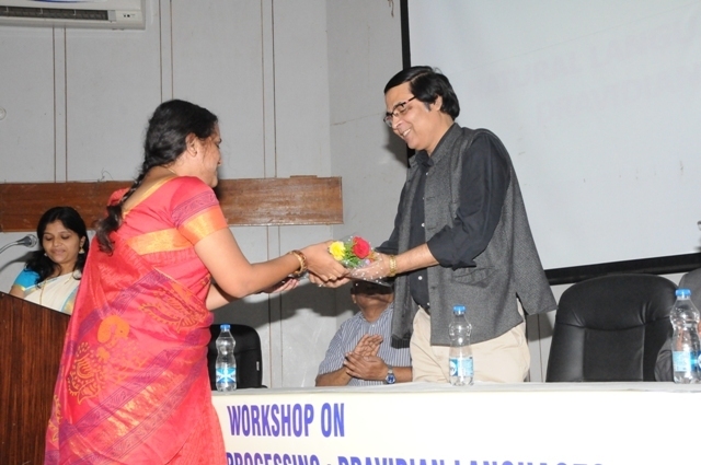 giving bouque to the chief guest